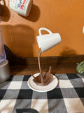 Floating Cup Spilled Coffee
