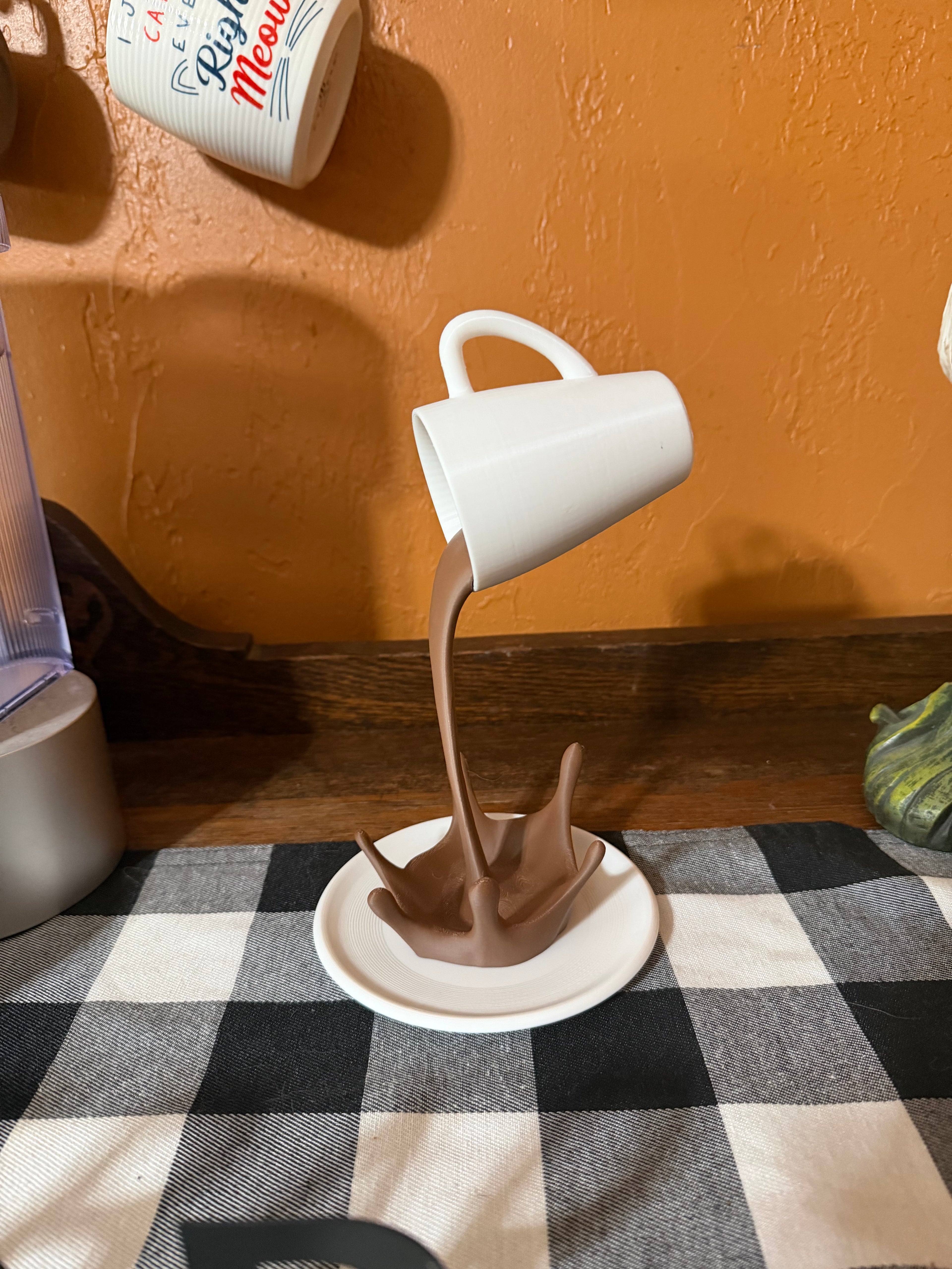 Floating Cup Spilled Coffee